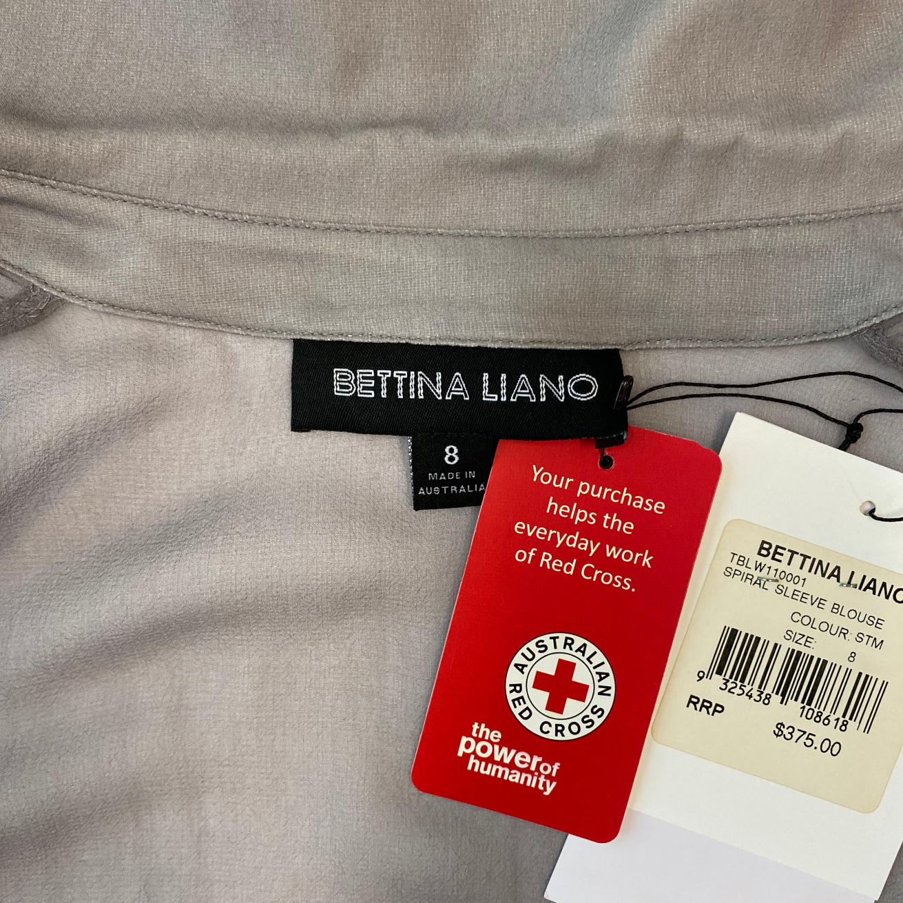 Bettina Liano Spiral Sleeve Blouse